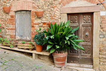 Entrance of an old house in the Montemerano, Grosseto, Tuscany, Italy. 