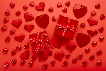Red hearts on red background. Romantic background for Valentine's day