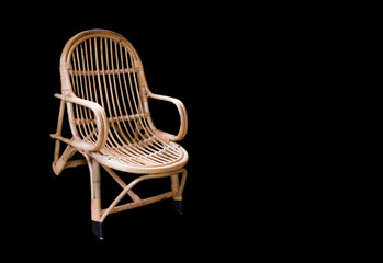 Bamboo Cane Chair for Living Room Sitout Balcony and Garden, isolated on black background.