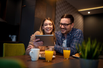 Couple using tablet together