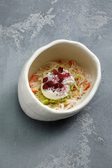 Crab meat with poached egg on top. Served in restaurant