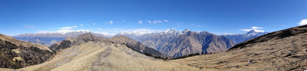 view of the mountains Panorama of Himalayan mountain range visible from Kuari pass trek