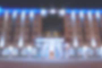 Abstract blur photo of illuminated building exterior for the background