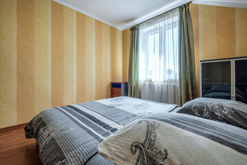 interior of cheapest bedroom in studio apartments or hostel.