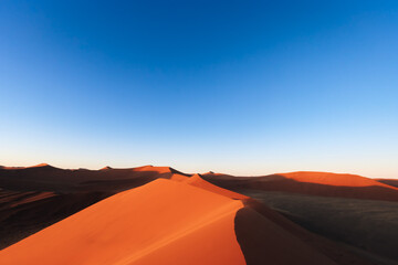 Fototapeta na wymiar incredible dunes during sunrise at sossuvlei national park in Namibia 