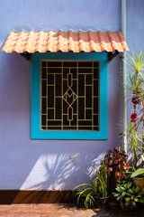 Vintage walls and windows windows of Goan houses in Fontainhas Panaji, Goa. Places to visit in Goa when on vacation.
