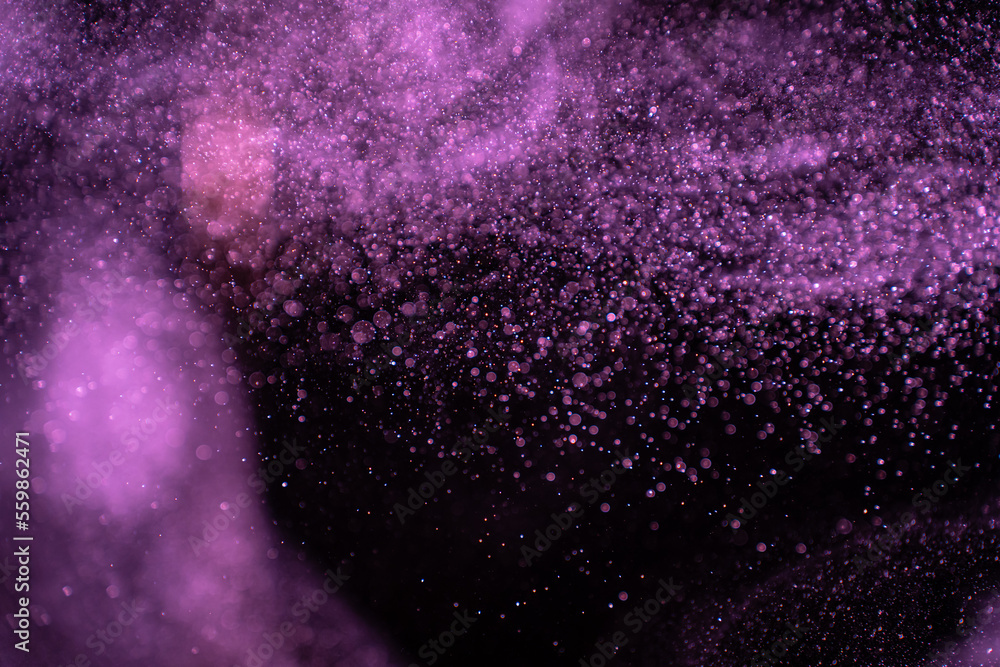 Wall mural abstract real dust particles on black background. glittering sparkling bokeh overlay design with cop