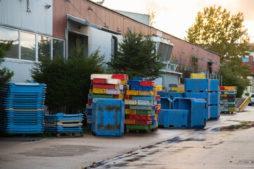 The fish factory has stopped working. Crisis in the fish industry. Empty fish boxes.