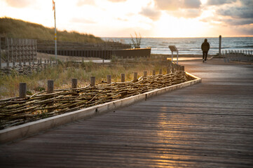 The wicker fence protects the dunes from being washed away. Dune protection.