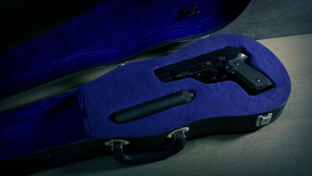 Hitman Opens Instrument Cases With Gun And Leaves