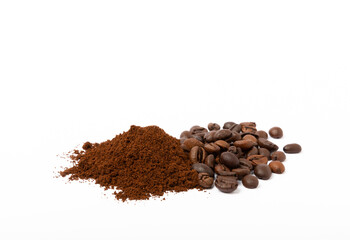 Ground coffee and coffee beans isolated on white background.
