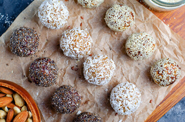 Assorted Vegan Sweets, Delicious Candy Balls with seeds, dried fruit, nuts, and cocoa powder, Healthy Candies