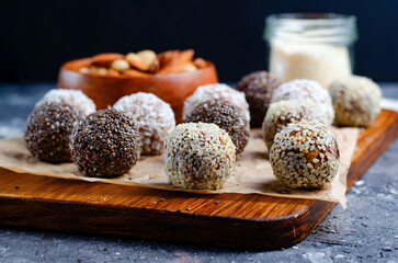 Assorted Vegan Sweets, Delicious Candy Balls with seeds, dried fruit, nuts, and cocoa powder, Healthy Candies