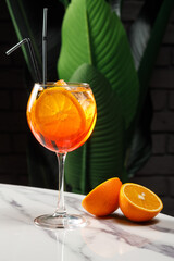 Glass of iced alcohol cocktail in bar