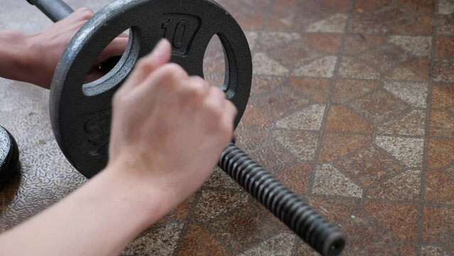 Home gym barbell changing weights plate exercise sport