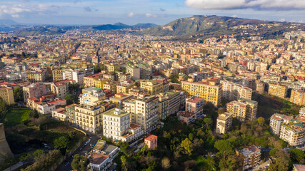 Fototapeta premium Aerial view of the hill and residential district of Vomero in Naples, Italy. Many are the buildings built in the narrow streets of the city.