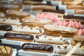 various delicious sweet pastries in the shop window.
