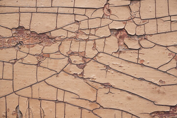 close up texture of cracked paint on wooden board