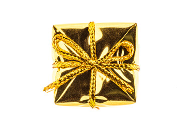 Gift box of gold color isolated on white background