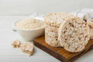 Stack of crispy rice cakes on white texture wood. Diet bread. Diet. proper nutrition. GLUTEN FREE. Copy space. Place for text.
