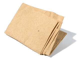 Piece of crumpled brown paper isolated on white background