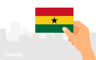 Hand holding the flag of Ghana on the background of the city in minimal flat style. Vector illustration