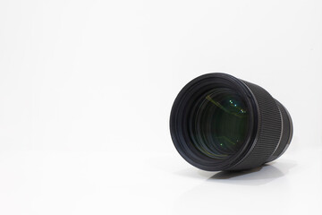 Objective lens of photo camera for photo or video close up , isolated over white. Photography...