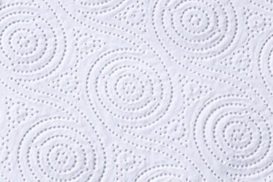 Detail close-up of recyclable paper napkins. Texture of an absorbent napkin with circle patterns.