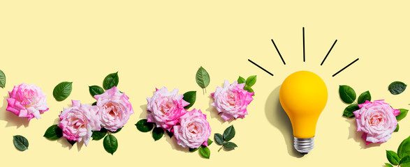 Light bulb with pink roses - flat lay