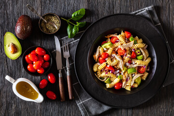 Chicken Pasta Salad with Avocado, Tomato in bowl