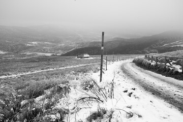 Shepherd's hut. Winter landscape with wooden shepherd's hut. Highlander's cottage.