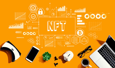 NFT theme with electronic gadgets and office supplies - flat lay