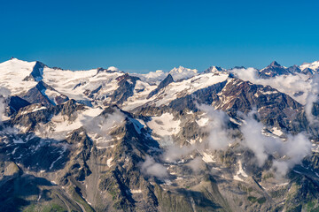 Fototapeta premium Switzerland 2022, Beautiful view of the Alps and Blue Sky around Titlis mountain.