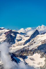Obraz premium Switzerland 2022, Beautiful view of the Alps and Blue Sky around Titlis mountain.