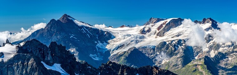 Naklejka na ściany i meble Switzerland 2022, Beautiful view of the Alps and Blue Sky around Titlis mountain.