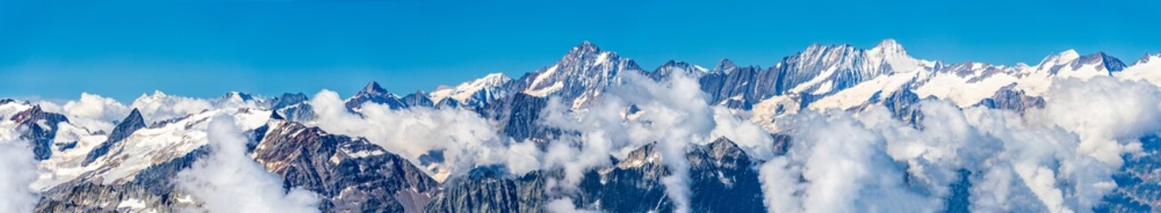 Naklejka premium Switzerland 2022, Beautiful view of the Alps and Blue Sky around Titlis mountain.