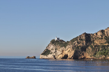 Fototapeta na wymiar Coasts of Bacoli from the sea (Napoli)