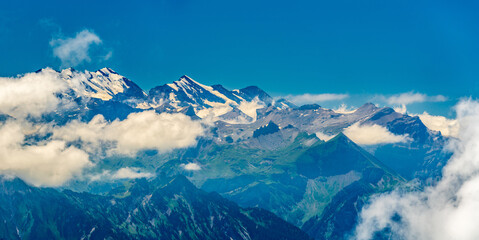 Fototapeta na wymiar Switzerland 2022, Beautiful view of the Alps from Brienzer Rothorn. Schynige Platte.