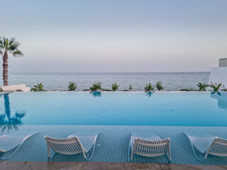Fototapeta na wymiar Swimming pool with sea view