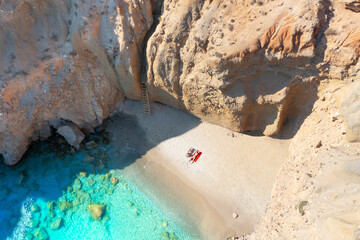 The famous Tsigrado beach with crystal clear waters and rocks. Great place for snorkeling. Milos...