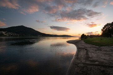 View of the miño river and the Eiras river beach at sunset in O Rosal