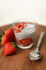 Strawberry Chia Seed Pudding with Strawberries on Kitchen Countertop