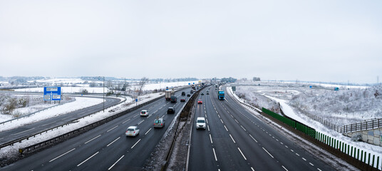 M1 motorway near junction 11 in England during winter season