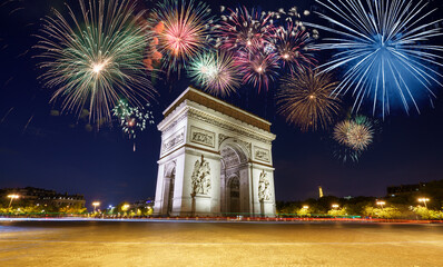 Arc De Triomphe with fireworks during New Year celebration in Paris. France