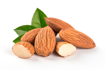 Close up Almonds with leaves on a white background.
