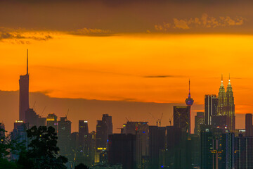 Fototapeta premium Kuala Lumpur city view from during sunset overlooking the KL city skyline