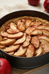 Delicious apple pie on white table, closeup