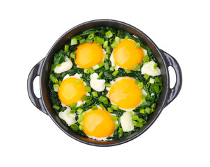 Frying pan with green shakshuka isolated on white