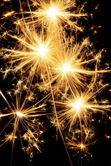 Sparklers on black background. IA Tehnology