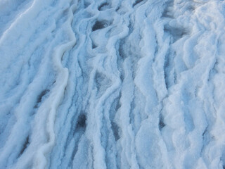 natural texture background frozen snow on the seashore, copy space